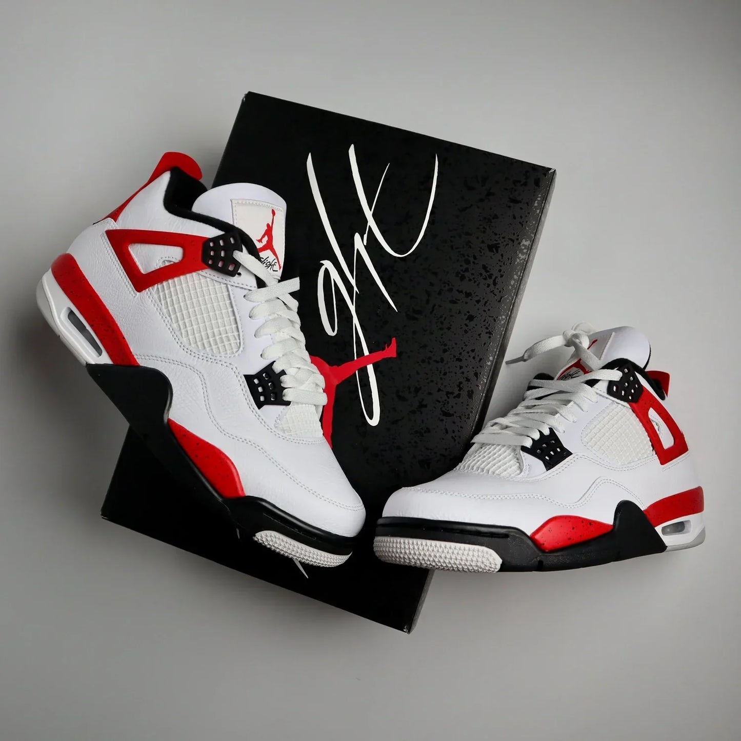 Jordan 4 red cement